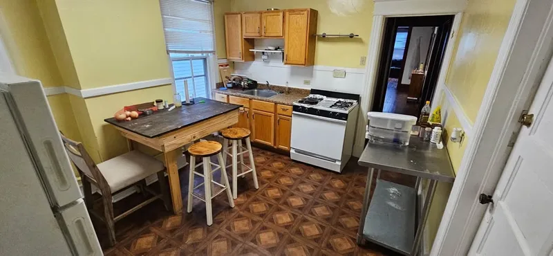 Spare room in Evanston house near campus